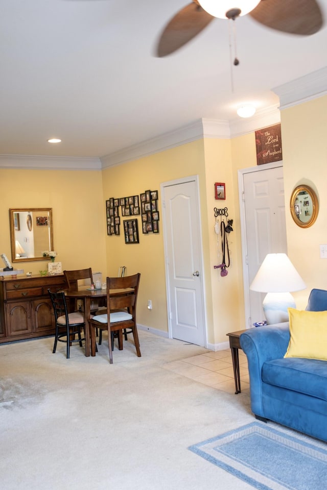 living room with a ceiling fan, light colored carpet, baseboards, ornamental molding, and recessed lighting