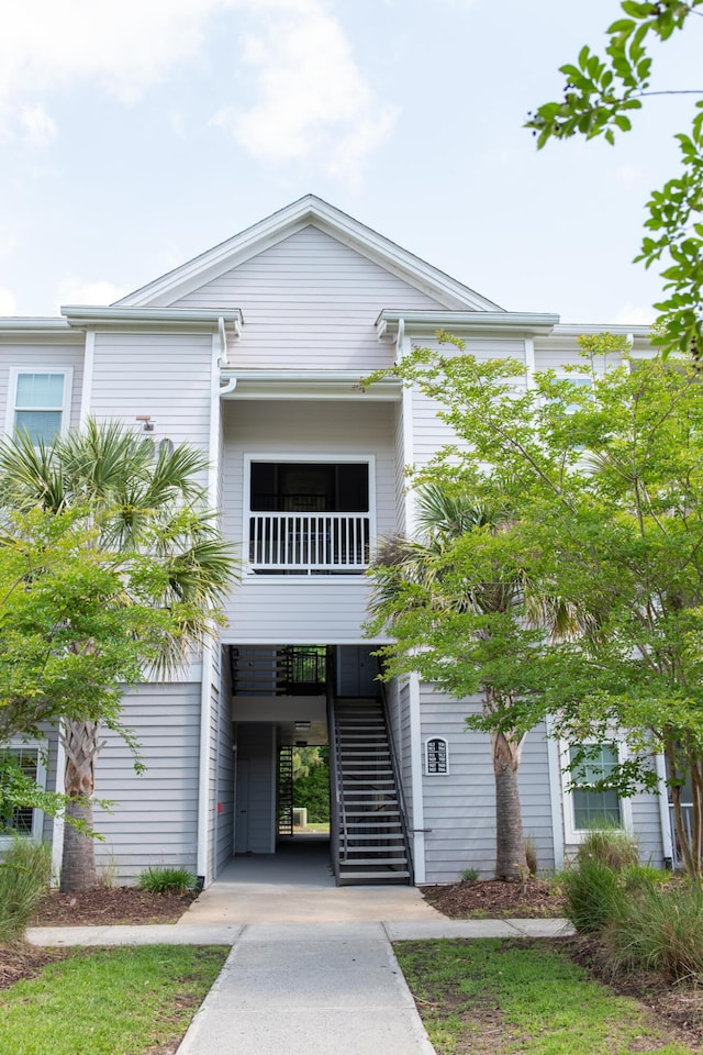coastal home featuring stairs