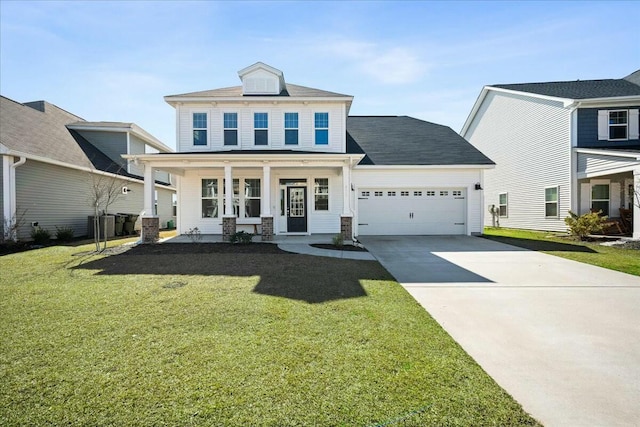 view of front of property with an attached garage, driveway, a front lawn, and a porch