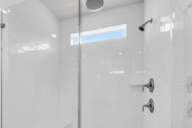 room details featuring a shower stall