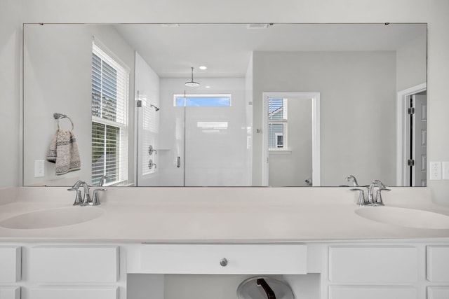 full bathroom featuring vanity and a shower stall