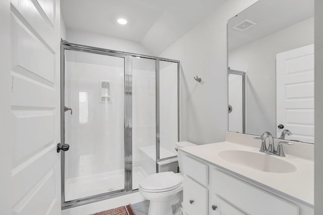 full bath with vanity, a stall shower, toilet, and visible vents