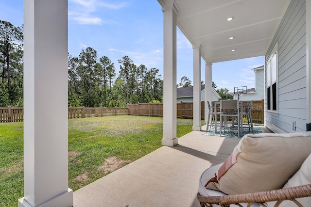 view of patio / terrace featuring a fenced backyard and outdoor dining space
