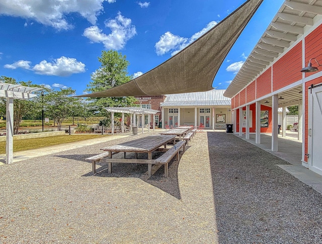 view of property's community with a pergola