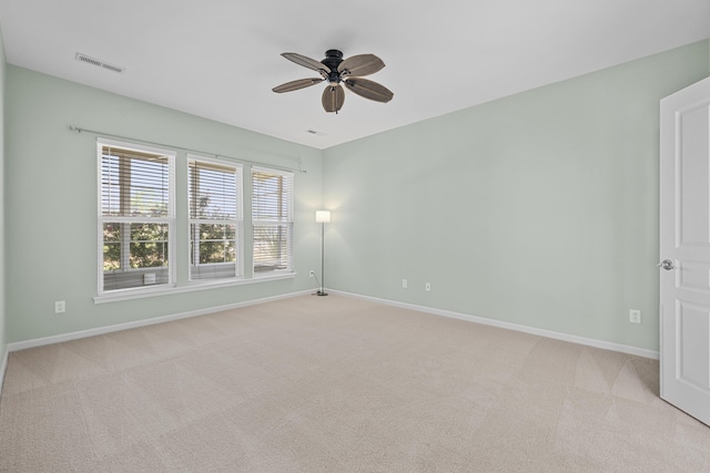 554 Tranquil Waters Way, Summerville, SC 29486 - unfurnished room featuring light carpet, baseboards, visible vents, and ceiling fan