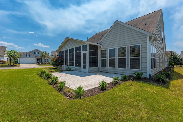 554 Tranquil Waters Way, Summerville, SC 29486 - rear view of property with a lawn, a sunroom, and a patio area