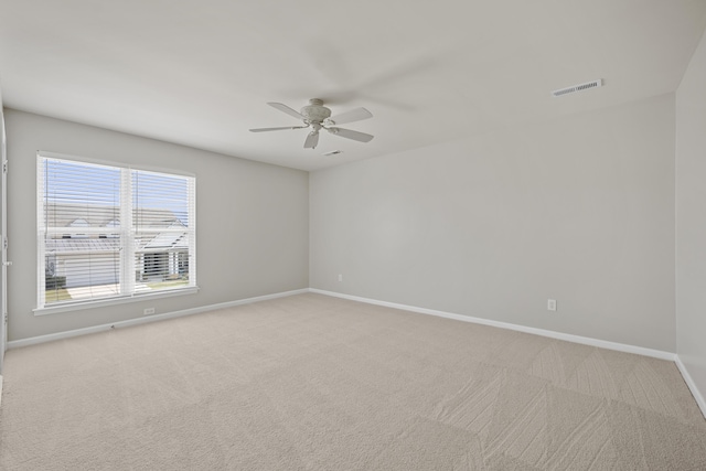 554 Tranquil Waters Way, Summerville, SC 29486 - empty room featuring visible vents, baseboards, ceiling fan, and light colored carpet