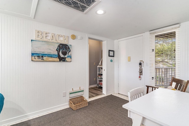 9000 Palmetto Dr Unit 202-C, Isle Of Palms, SC 29451 - dining area featuring dark carpet, visible vents, and baseboards