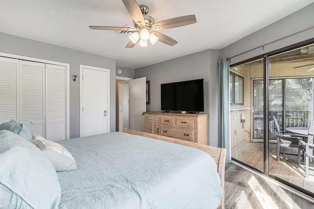 9000 Palmetto Dr Unit 202-C, Isle Of Palms, SC 29451 - bedroom featuring access to exterior, a ceiling fan, and wood finished floors