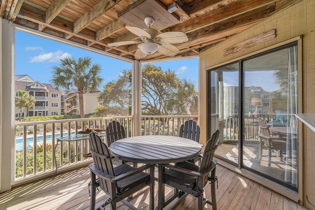 9000 Palmetto Dr Unit 202-C, Isle Of Palms, SC 29451 - sunroom / solarium with beam ceiling, ceiling fan, and outdoor dining space