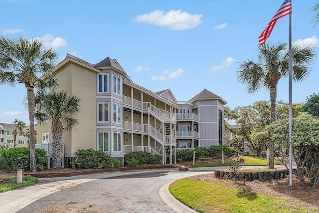 9000 Palmetto Dr Unit 202-C, Isle Of Palms, SC 29451 - view of property featuring curved driveway