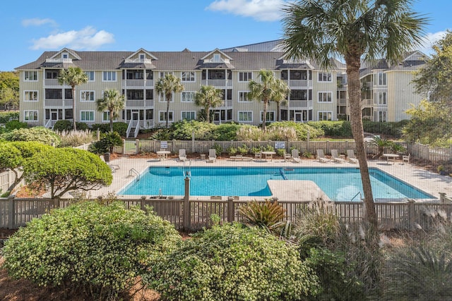 9000 Palmetto Dr Unit 202-C, Isle Of Palms, SC 29451 - pool featuring a patio and fence