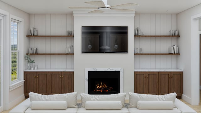 5209 Seewee Rd, Awendaw, SC 29429 - living room with ceiling fan and a premium fireplace