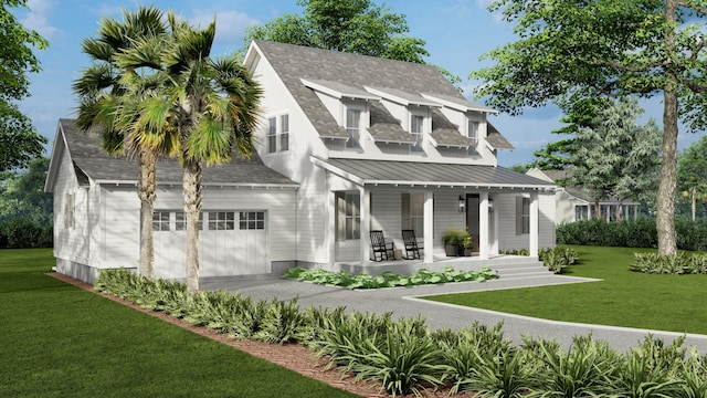 back of property with covered porch, a yard, and a garage