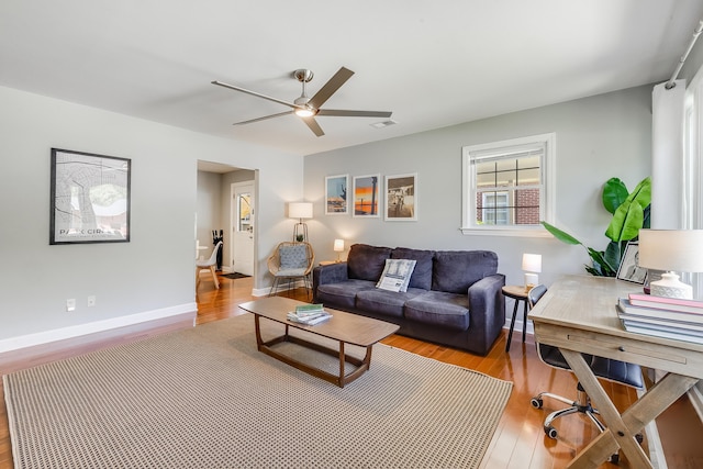 1821 Wasp St, North Charleston, SC 29405 - living area with baseboards, visible vents, ceiling fan, and wood finished floors