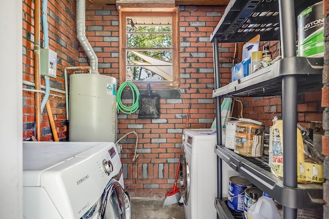1821 Wasp St, North Charleston, SC 29405 - laundry room with separate washer and dryer, laundry area, water heater, and brick wall
