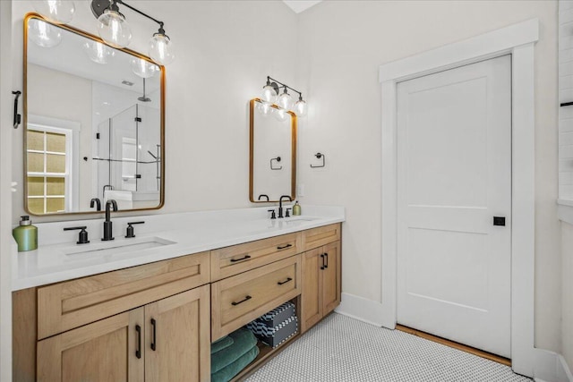 full bathroom with double vanity and a shower
