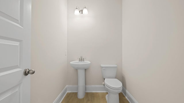 205 Bilge Rd, Ridgeville, SC 29472 - bathroom with toilet and wood finished floors