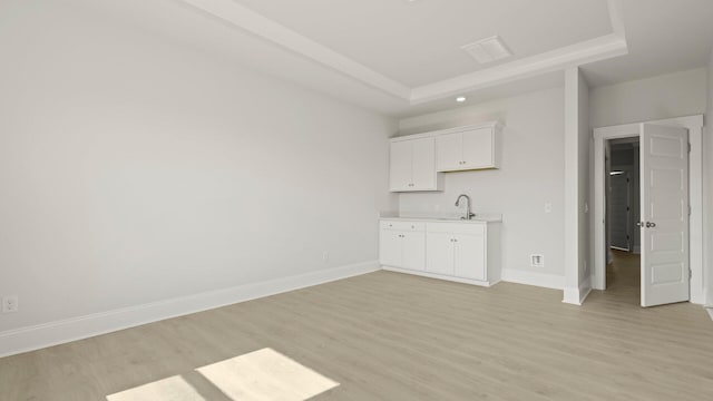 205 Bilge Rd, Ridgeville, SC 29472 - bar area with light wood-style floors, a tray ceiling, and recessed lighting