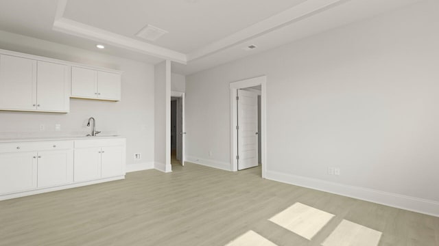 205 Bilge Rd, Ridgeville, SC 29472 - kitchen featuring light countertops, light wood-style flooring, white cabinets, and recessed lighting