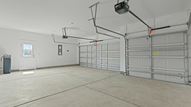 205 Bilge Rd, Ridgeville, SC 29472 - garage with a garage door opener and electric panel