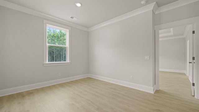 205 Bilge Rd, Ridgeville, SC 29472 - spare room featuring light wood-style flooring, crown molding, a smoke detector, and recessed lighting