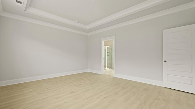 205 Bilge Rd, Ridgeville, SC 29472 - unfurnished room featuring light wood-style flooring and a raised ceiling