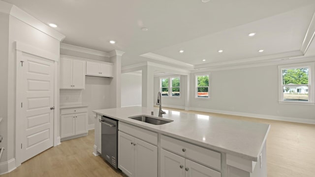 205 Bilge Rd, Ridgeville, SC 29472 - kitchen with plenty of natural light, a raised ceiling, light wood-style floors, crown molding, and white cabinetry