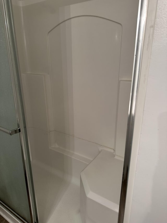 bathroom featuring walk in shower