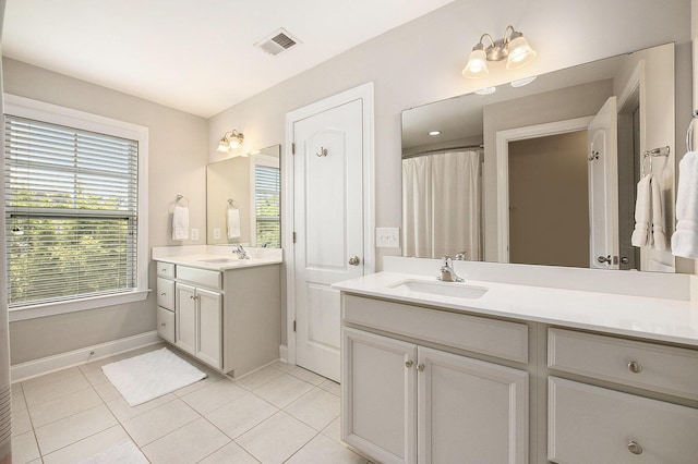 4117 Rigsby Ln, Charleston, SC 29414 - bathroom with tile patterned flooring and two vanities