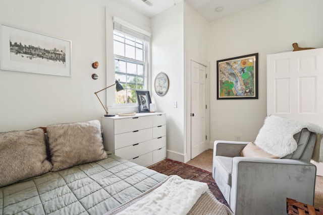 bedroom with light carpet