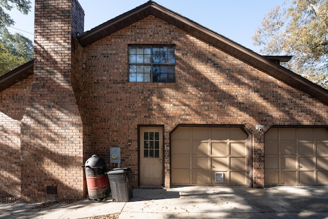 view of property exterior with a garage