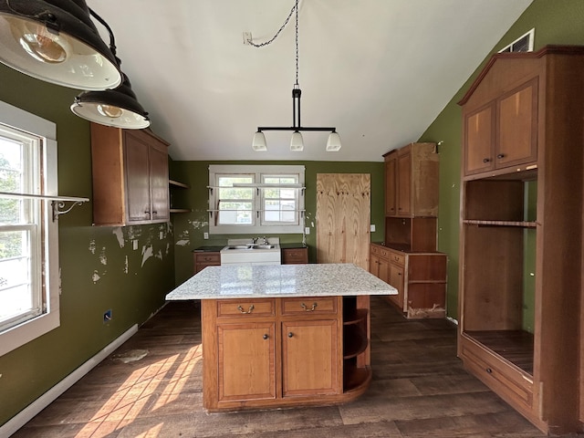 2204 Dover St, North Charleston, SC 29405 - kitchen with open shelves, vaulted ceiling, a kitchen island, a sink, and dark wood-style floors
