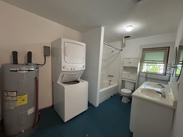2204 Dover St, North Charleston, SC 29405 - washroom featuring electric water heater, stacked washing machine and dryer, and a sink