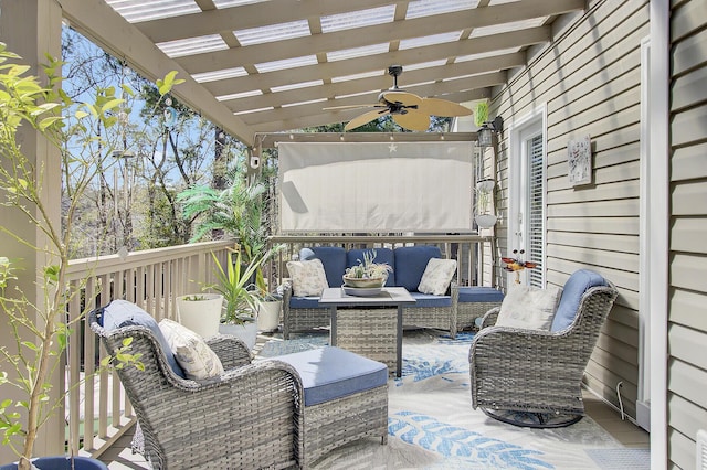 view of patio / terrace with a ceiling fan, a pergola, and an outdoor hangout area