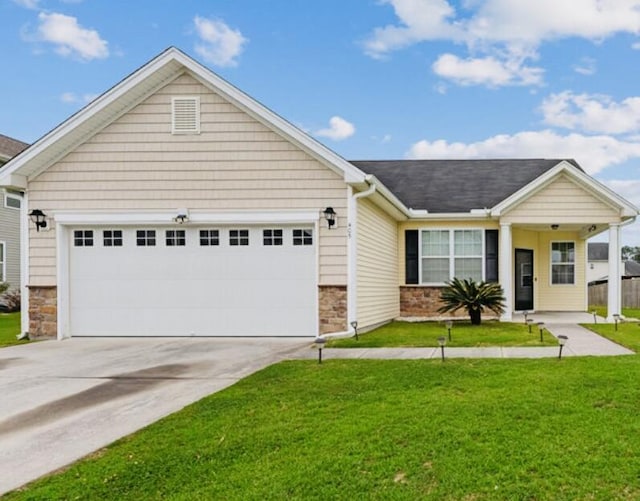 405 Watershed Dr, Goose Creek, SC 29445 - ranch-style house featuring stone siding, concrete driveway, an attached garage, and a front yard
