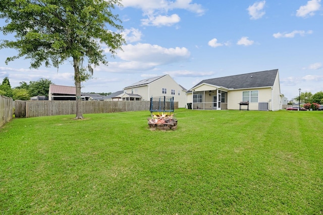 405 Watershed Dr, Goose Creek, SC 29445 - view of yard featuring a sunroom, a trampoline, and central air condition unit