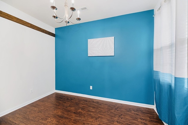 405 Watershed Dr, Goose Creek, SC 29445 - spare room featuring a chandelier, wood finished floors, and baseboards