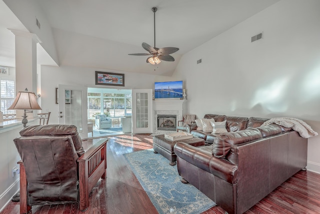 living room featuring ceiling fan, dark wood-type flooring, and high vaulted ceiling