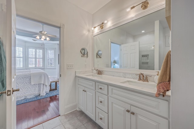 bathroom featuring vanity, tile patterned floors, and ceiling fan