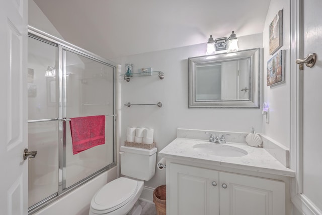 full bathroom with vanity, bath / shower combo with glass door, and toilet