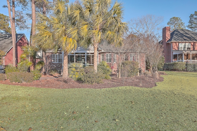 exterior space with a front yard