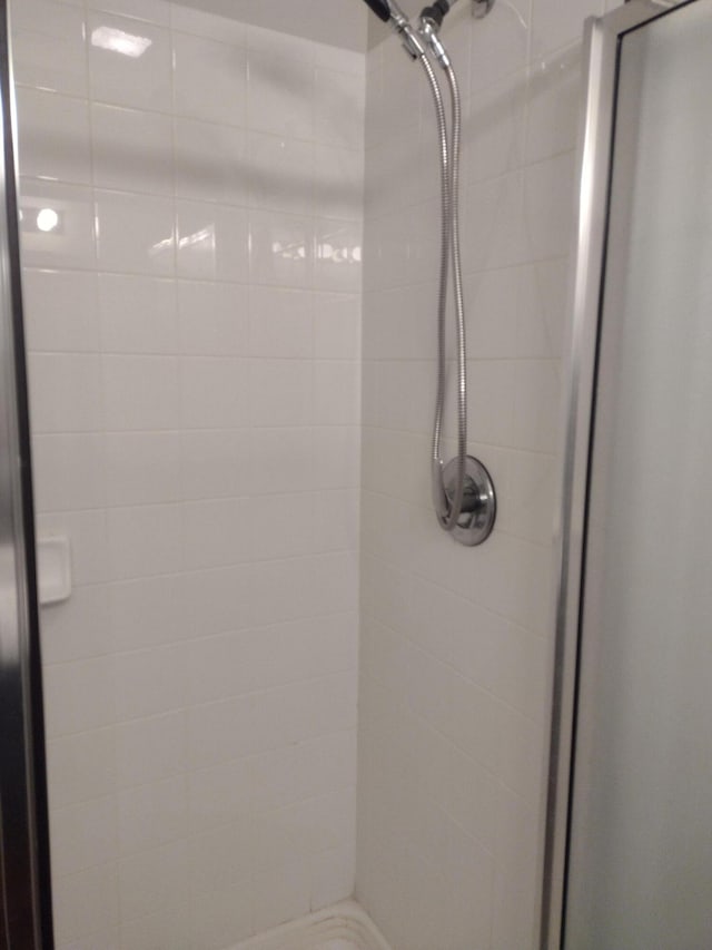 full bath featuring a stall shower