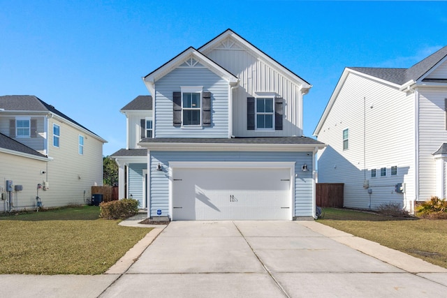 front facade with a front lawn and a garage