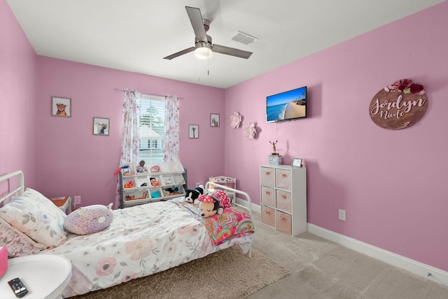 carpeted bedroom with ceiling fan