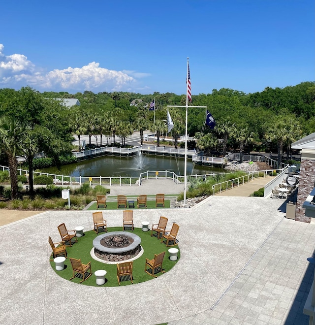 5802 Palmetto Dr Unit B 314, Isle Of Palms, SC 29451 - view of community featuring a fire pit and a water view