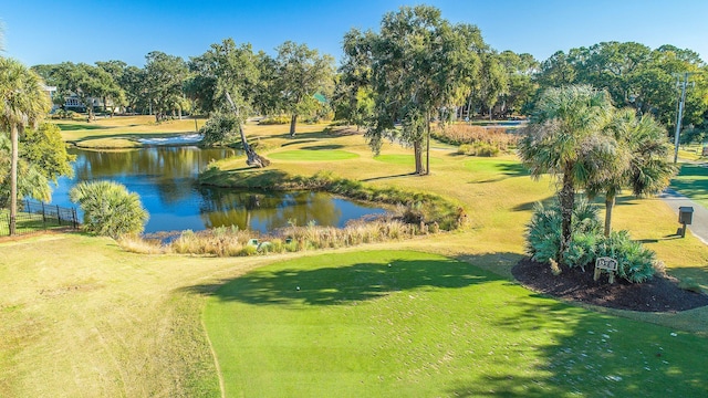 5802 Palmetto Dr Unit B 314, Isle Of Palms, SC 29451 - view of home's community featuring a water view, view of golf course, view of scattered trees, and a yard