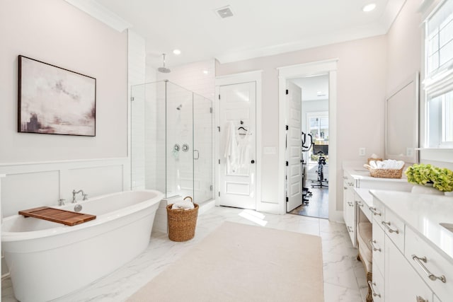 bathroom featuring vanity, crown molding, and plus walk in shower