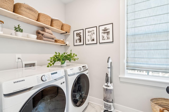 laundry room featuring separate washer and dryer