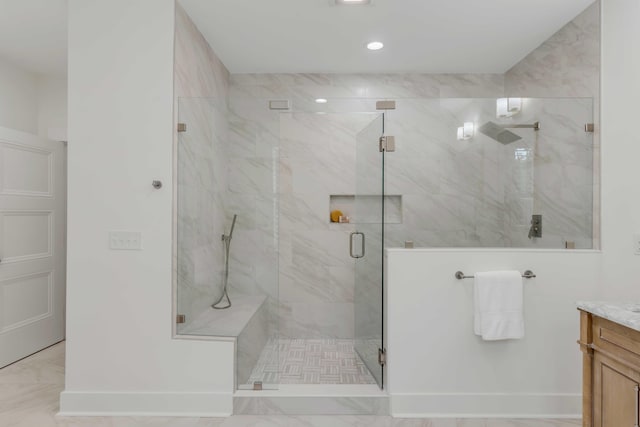 bathroom with vanity and walk in shower